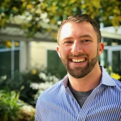 Headshot of Apple's Director of Environmental Initiatives, Chris Busch